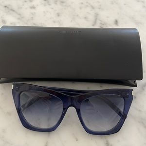 Selling brand new never used YSL sunglasses.  In gorgeous blue frames. 55mm